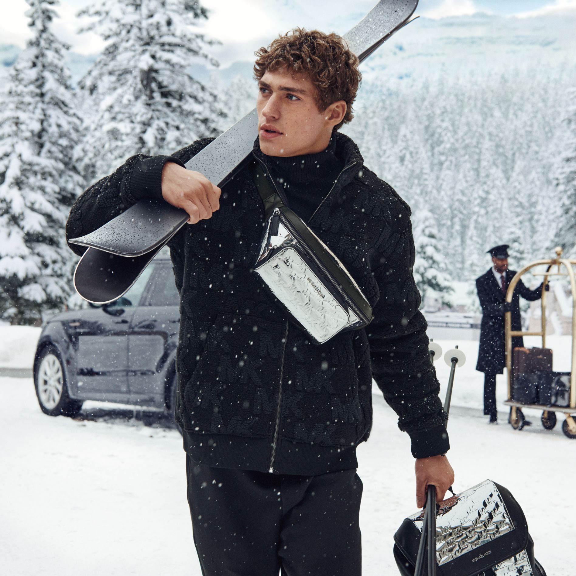 male model with metallic belt bag