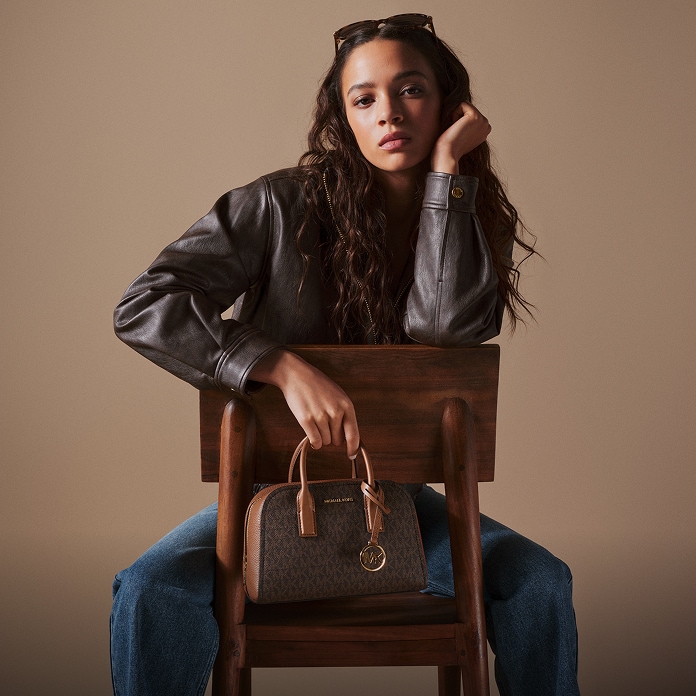 model holding ashton bag