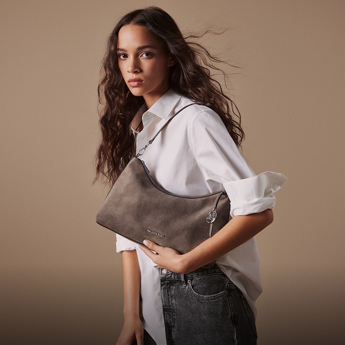 model holding sammy bag