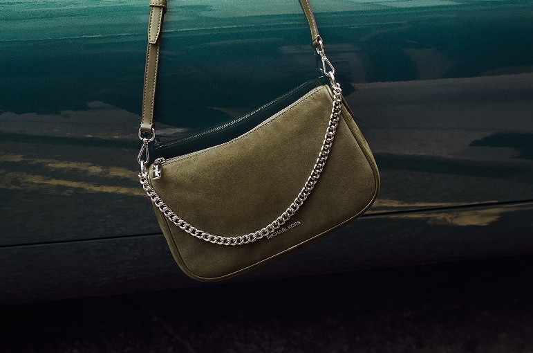 green suede handbag
