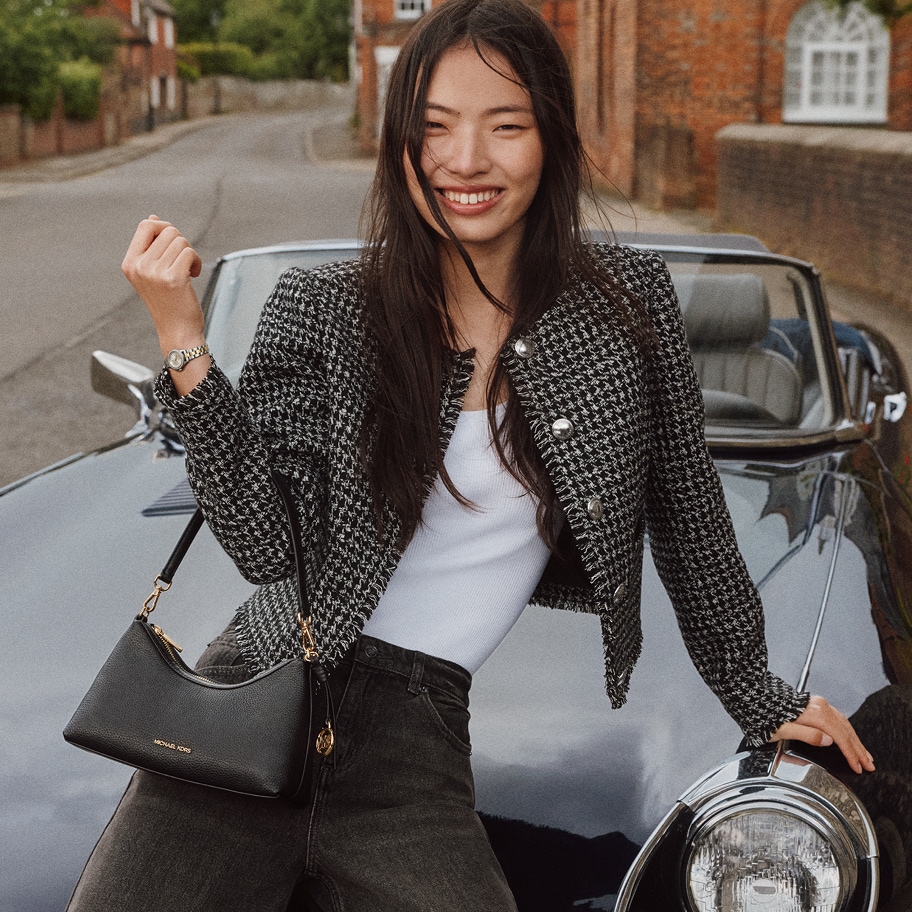 model holding sammy bag