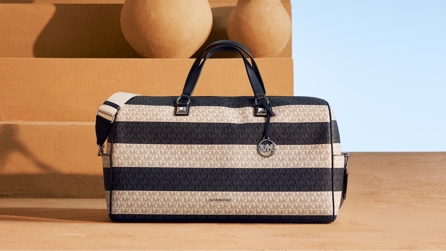sac de voyage ray&eacute; bleu et blanc &agrave; logo