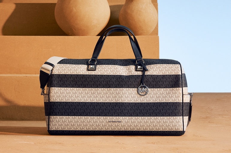 sac de voyage ray&eacute; bleu et blanc