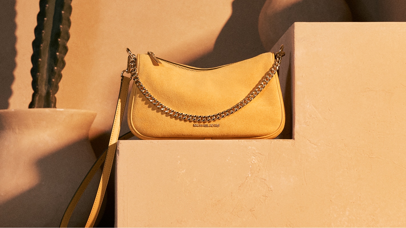 yellow suede crossbody bag with chain strap