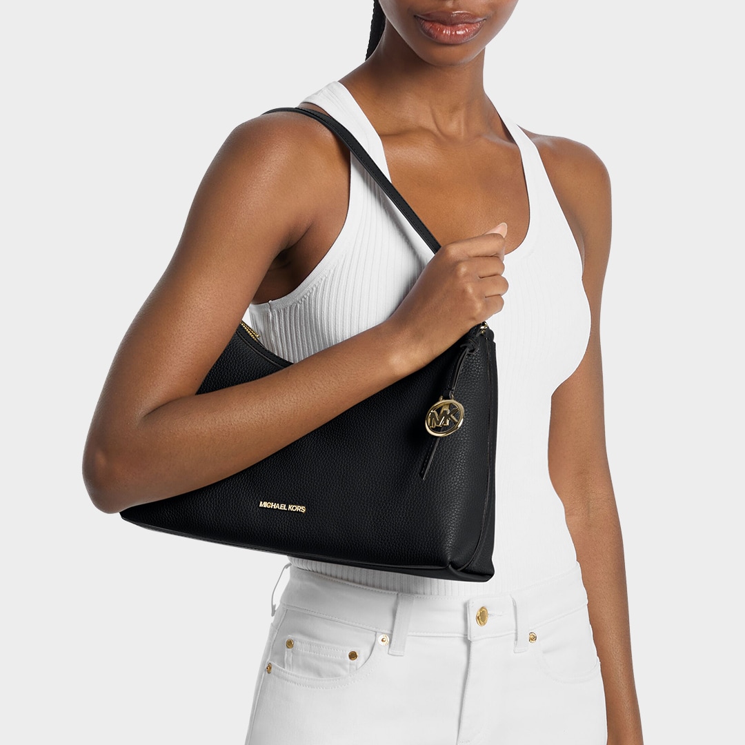 model with black sammy shoulder bag