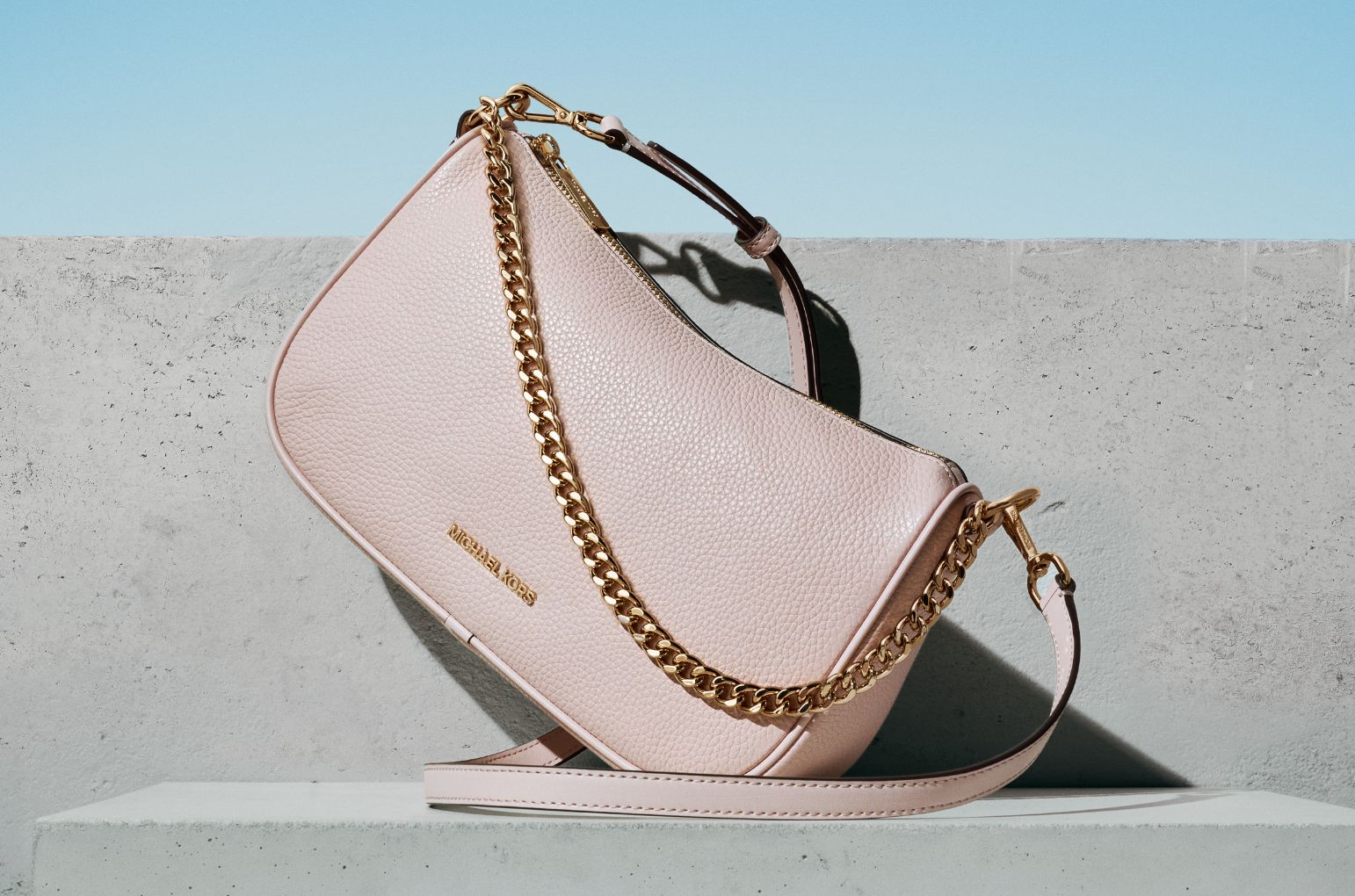 pink heart patterned handbag and wallet