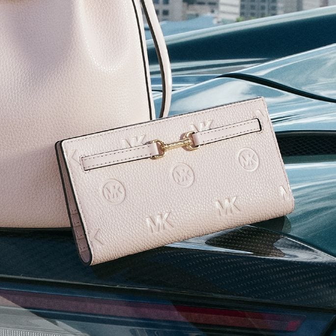 pale logo patterned wallet