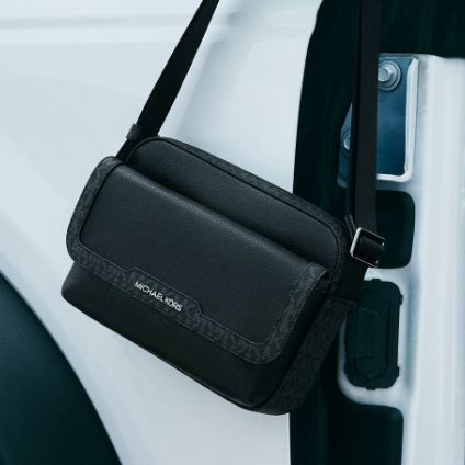 black leather sling pack bag