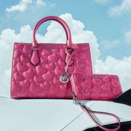 pink heart patterned handbag and wallet