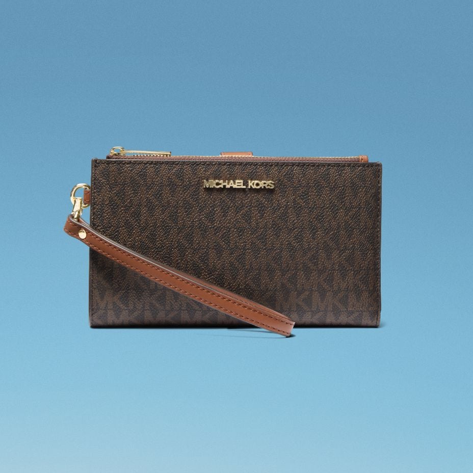 brown leather logo wristlet