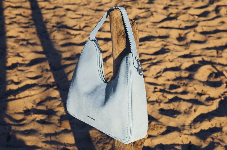light blue suede handbag