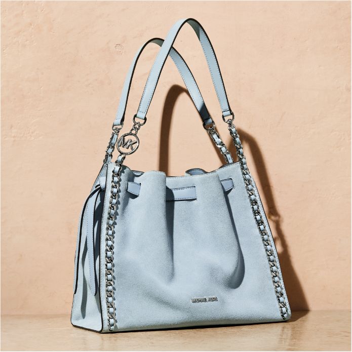light blue suede handbag