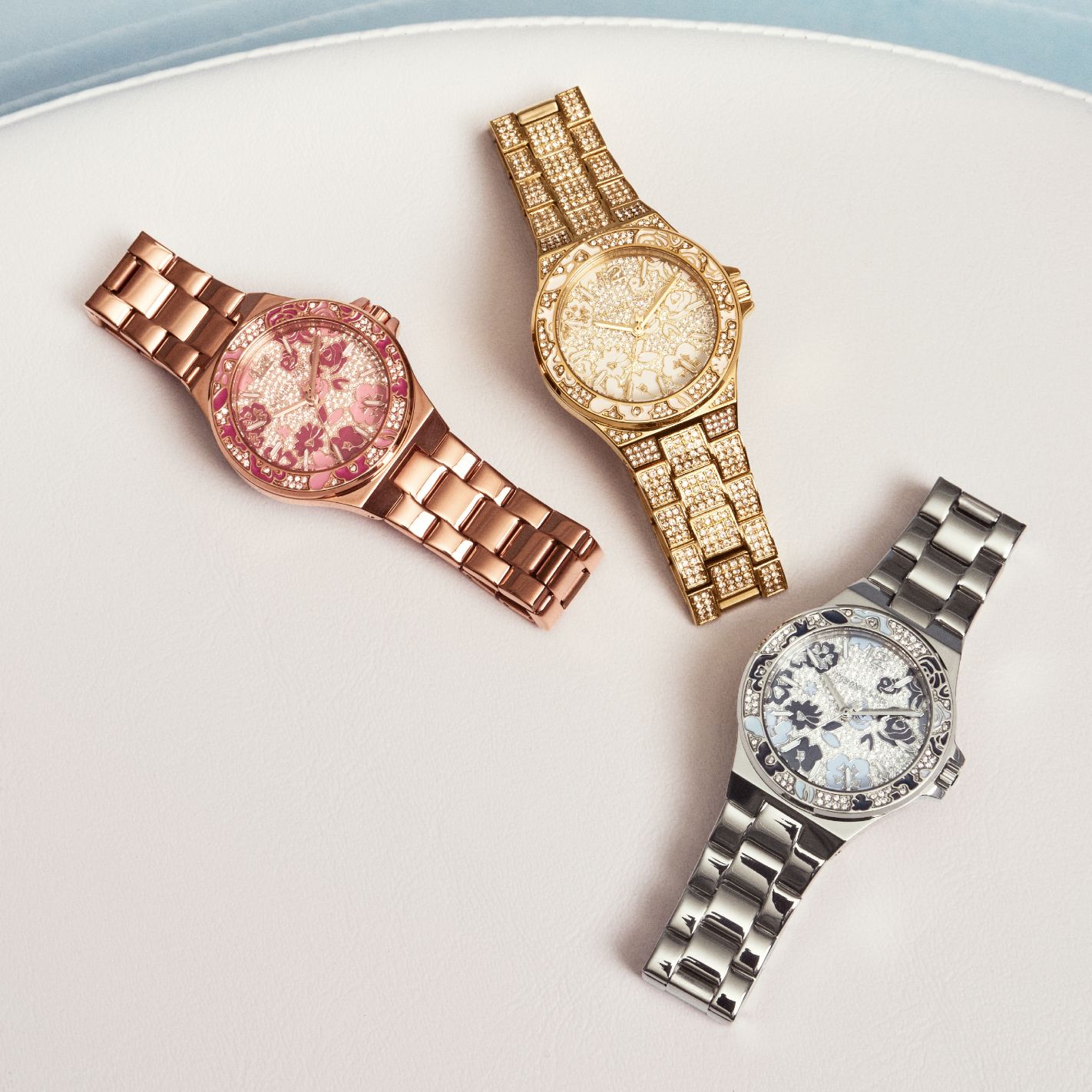 rose gold, gold, and silver watches