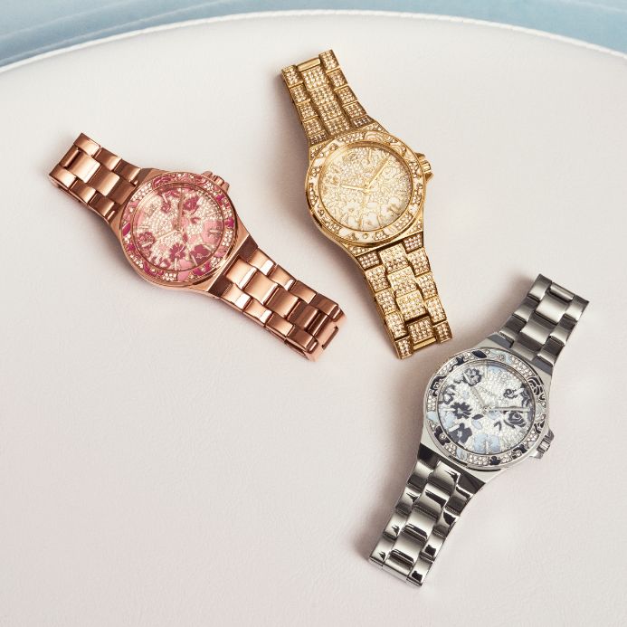 rose gold, gold, and silver watches