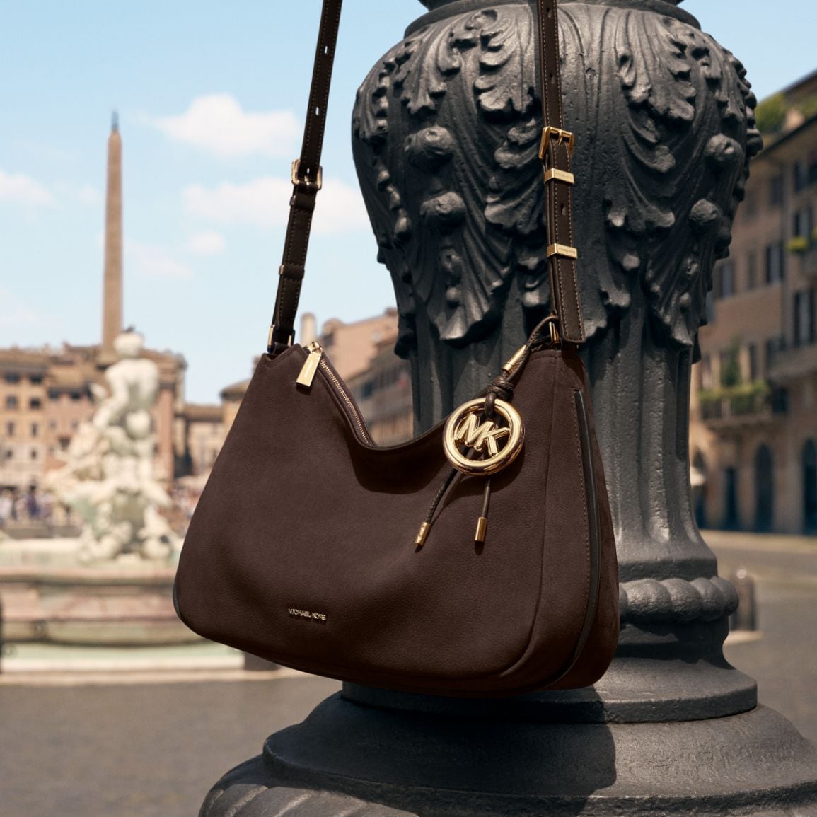 bag with gold MK charm