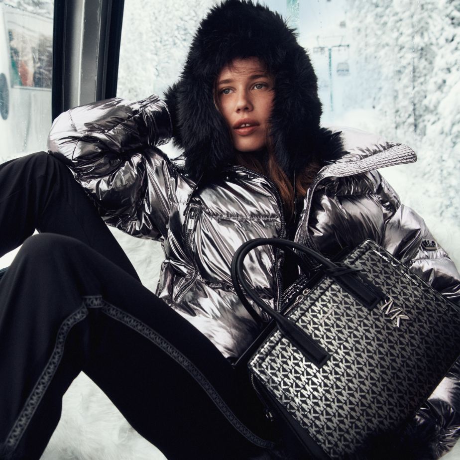 metallic puffer jacket and laila logo satchel