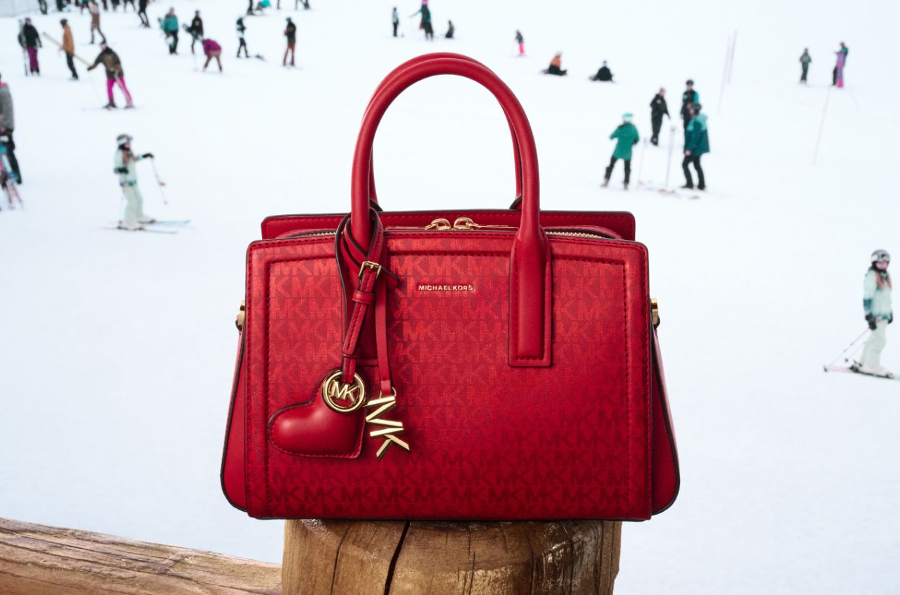 red laila logo handbag with charms