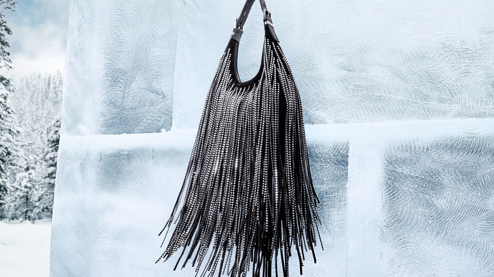 sac &agrave; &eacute;paule &agrave; clous et &agrave; franges