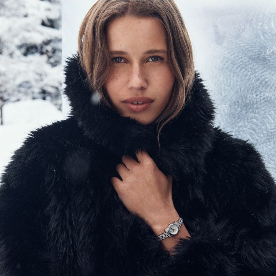 model with silver watch