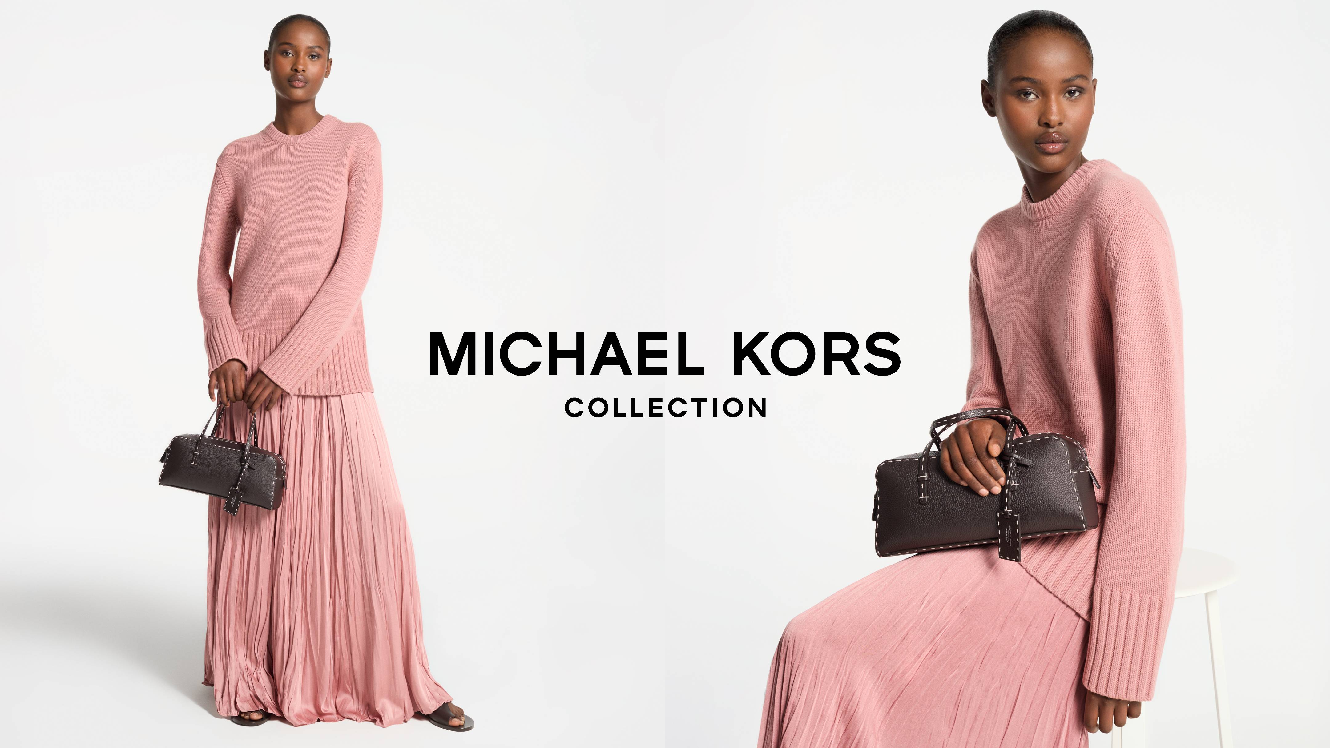 michael kors collection, model with pink sweater, pink skirt, and brown leather bag