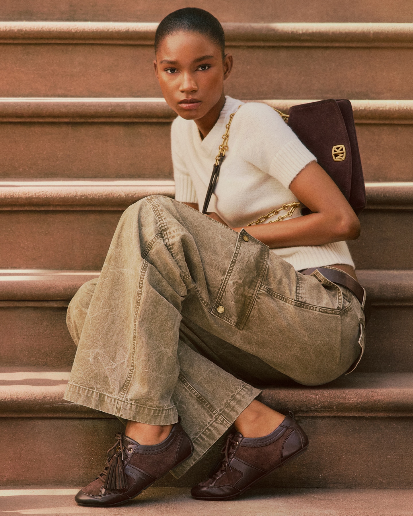 model in brown sneakers