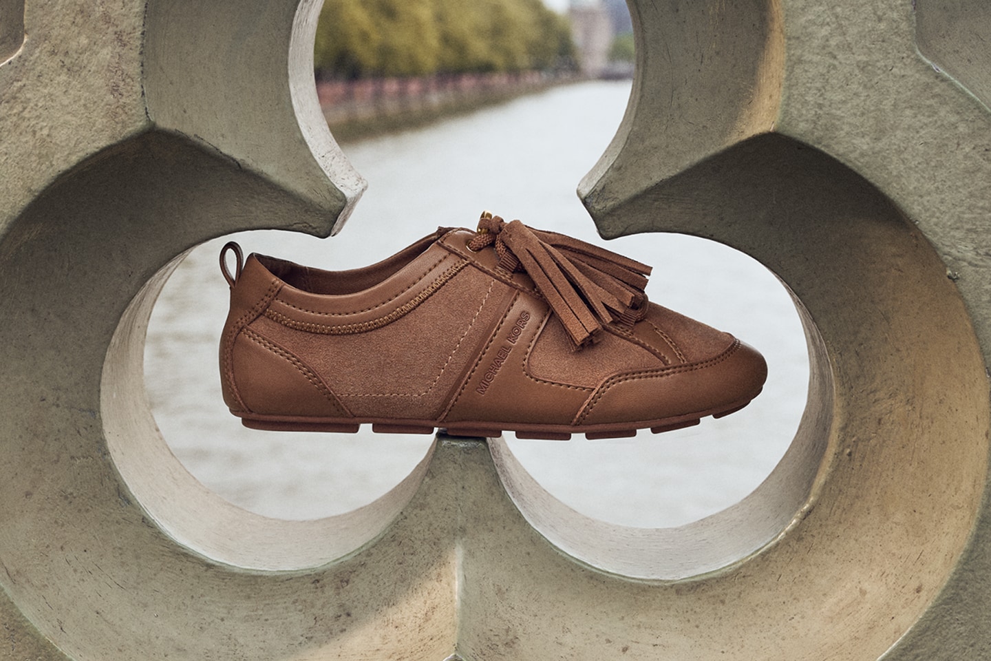 brown suede sneakers with tassels