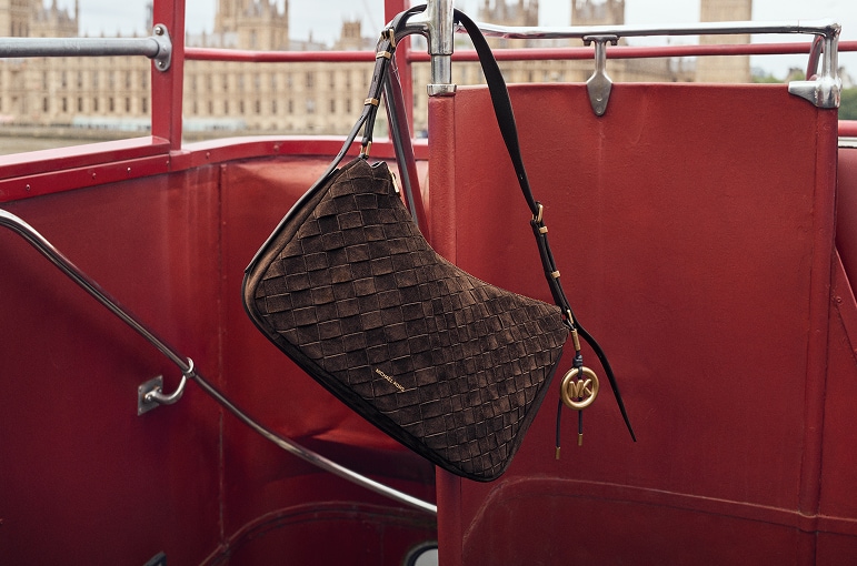 suede nolita woven handbag