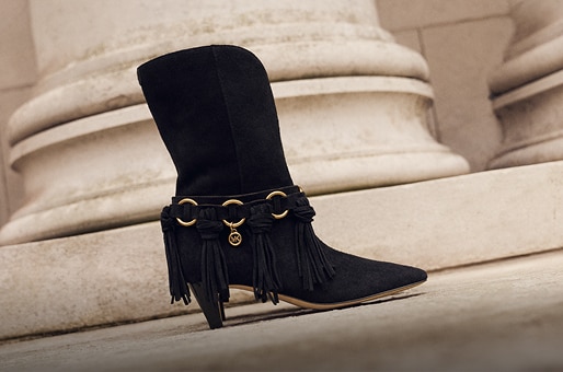 suede boot with fringe