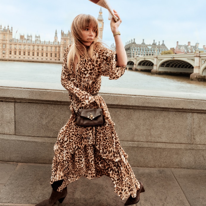 suki in leopard print dress