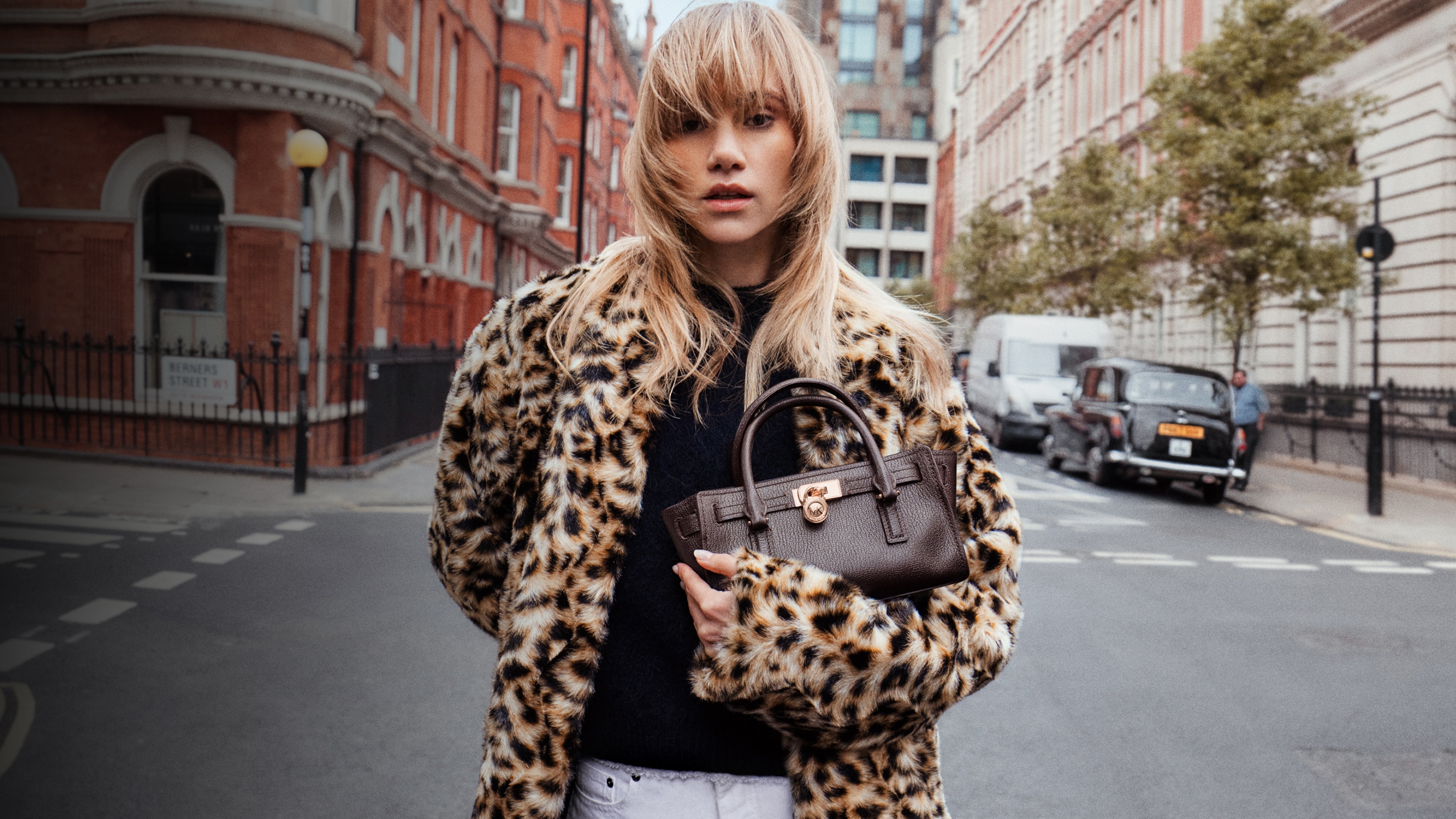 suki waterhouse holding brown mini hamilton mini bag