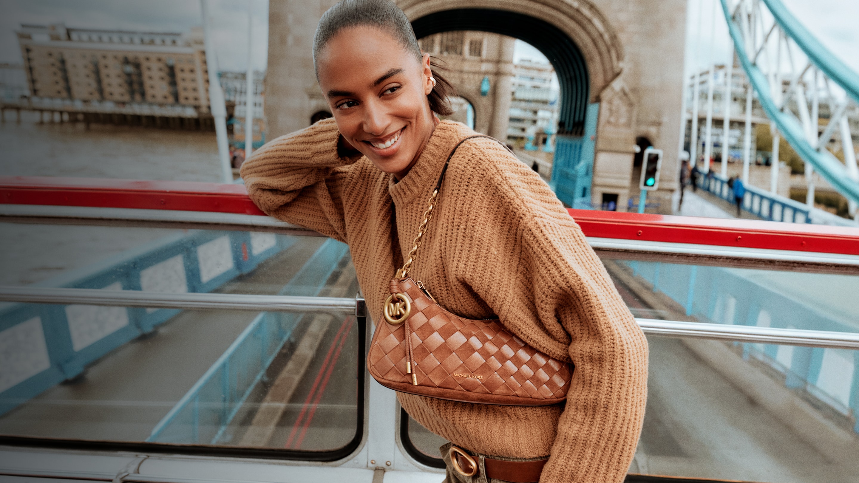 model wearing nolita shoulder bag