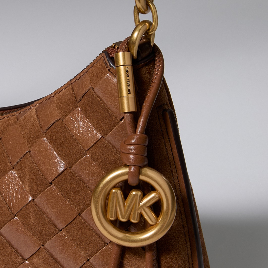 mk charm on nolita handbag