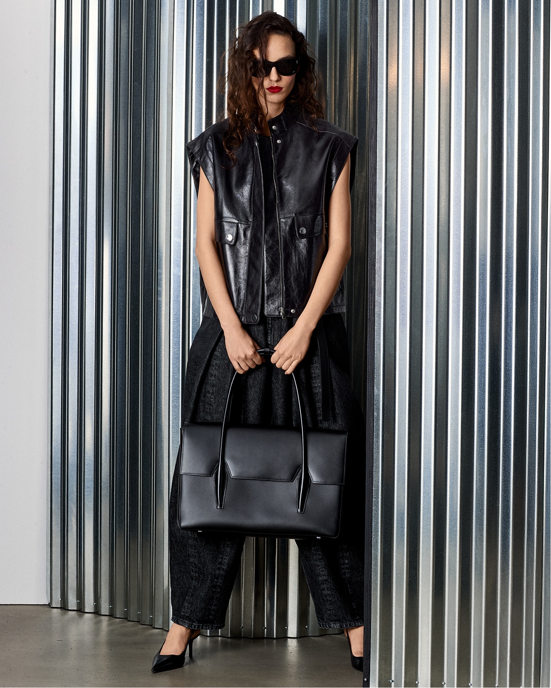 model in black outfit