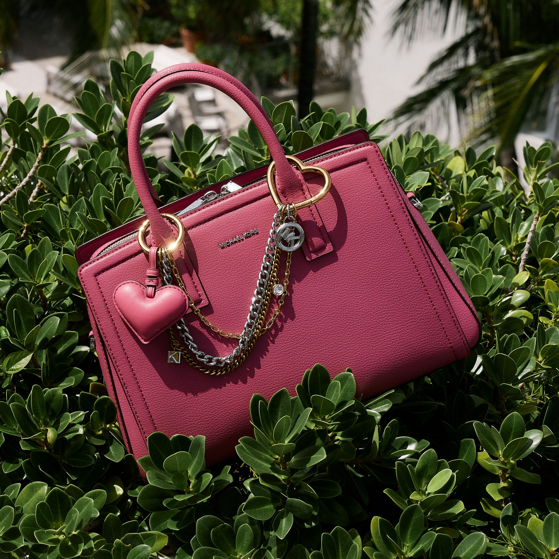 laila pink satchel with charms