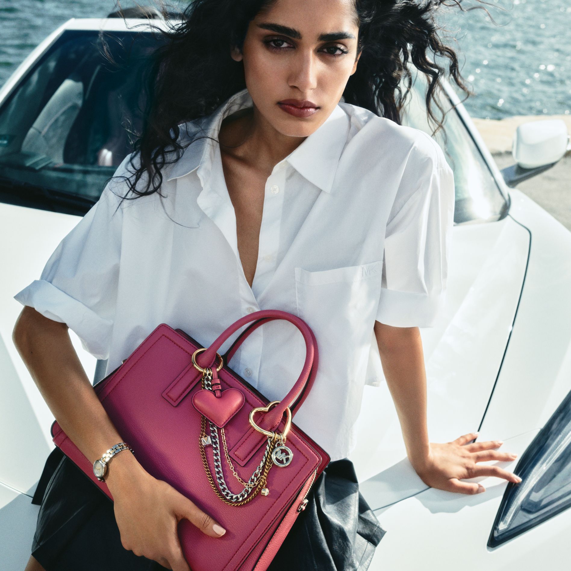 model with pink handbag