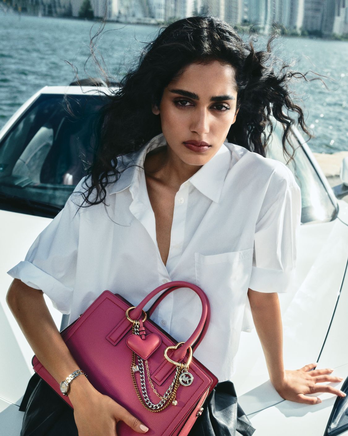 pink laila satchel with charms