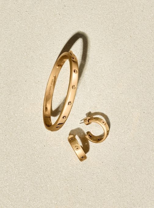 gold bracelet and earrings