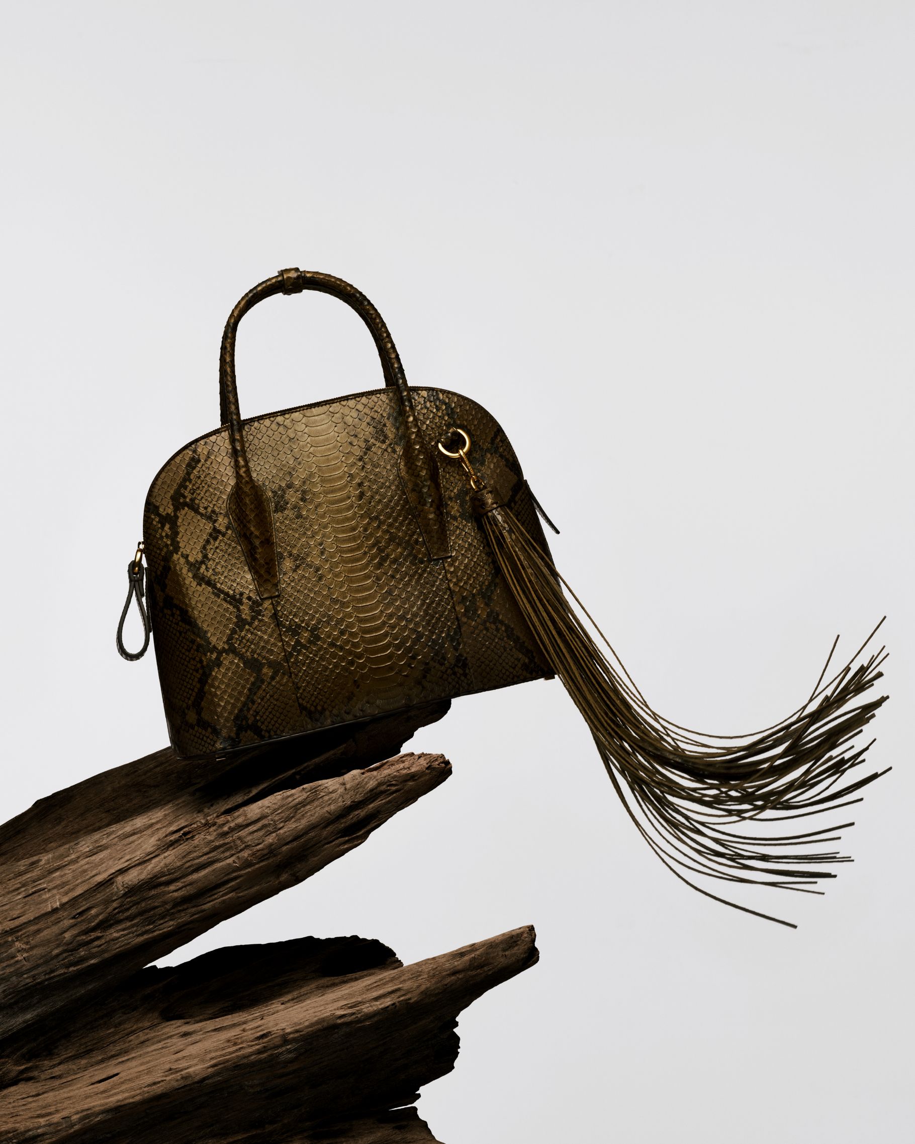 python pattern handbag with tassel