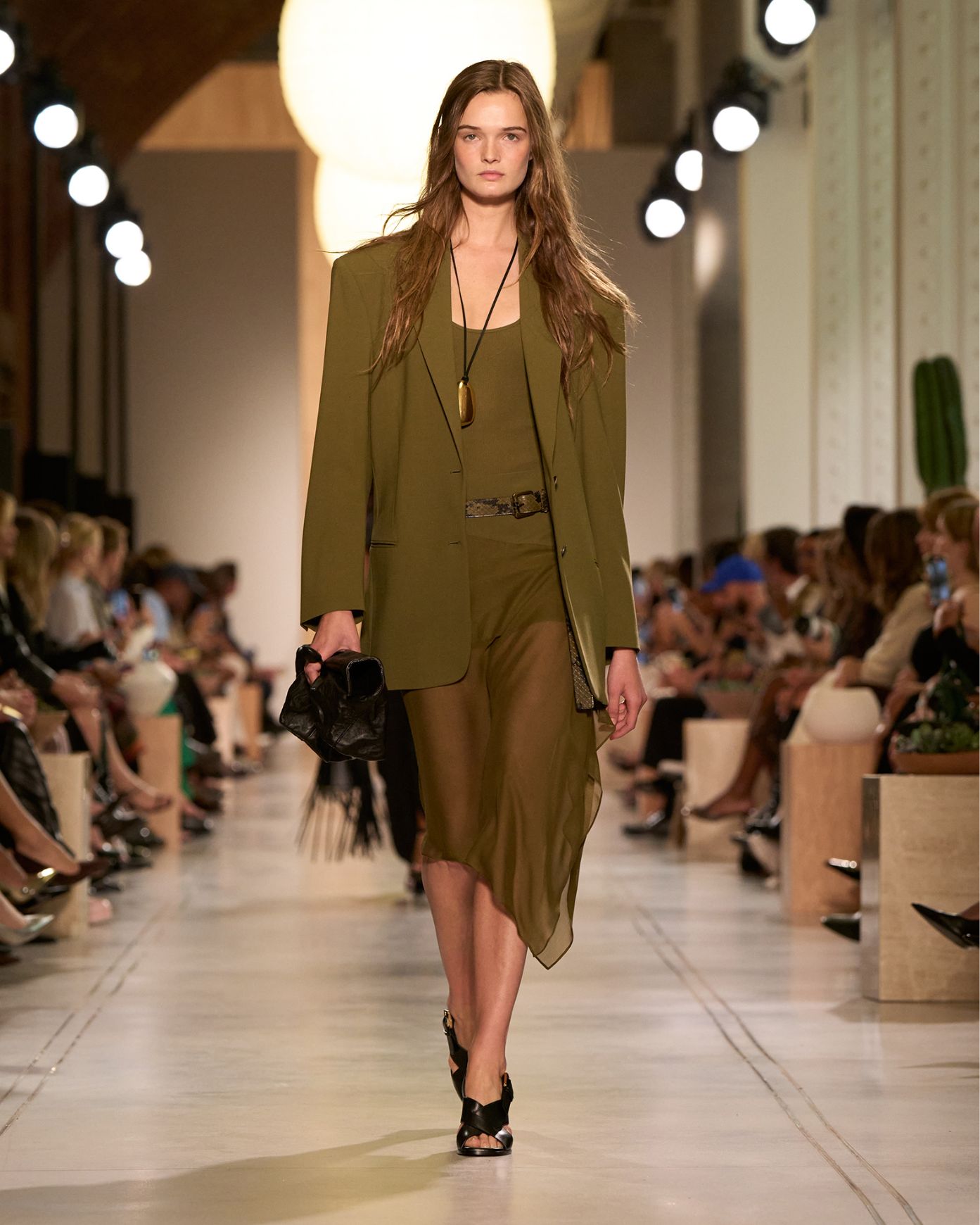 model in olive sheer skirt