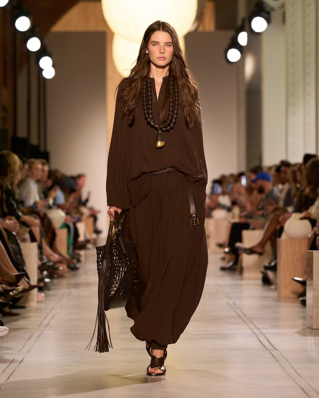 model with brown accessories