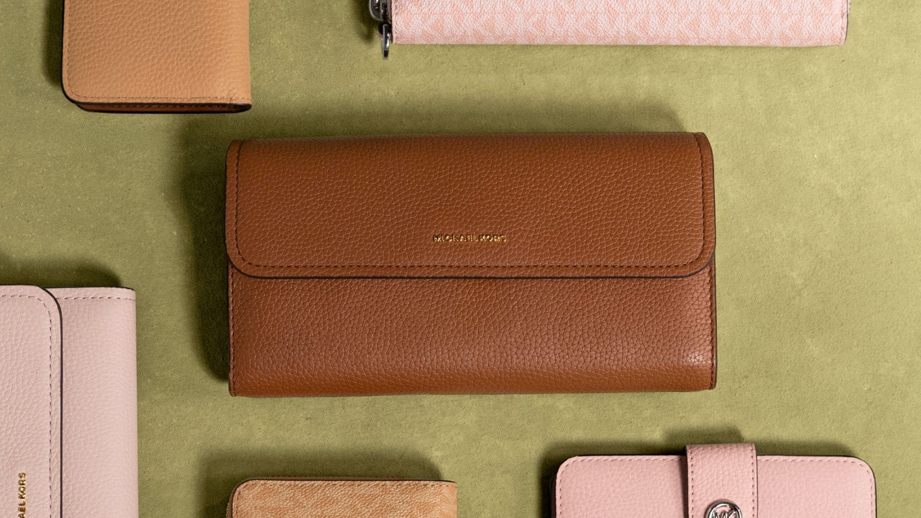 brown and pink wallets