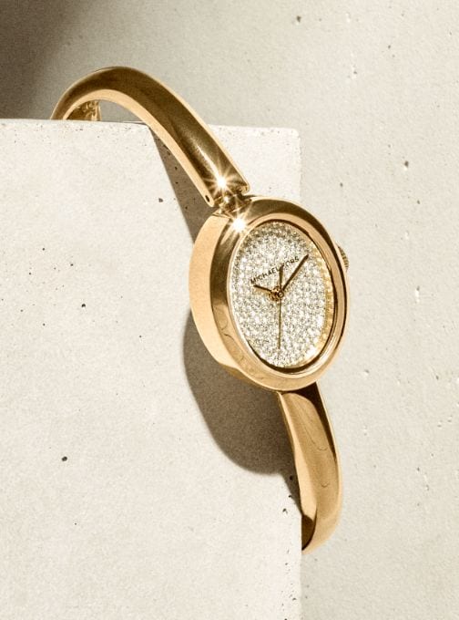 gold watch with crystals