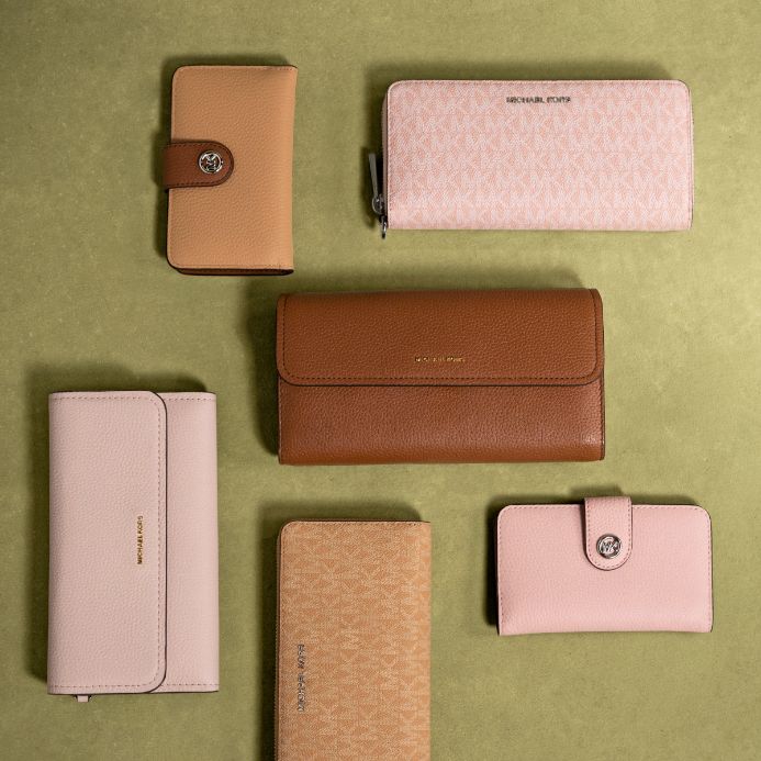 brown and pink wallets